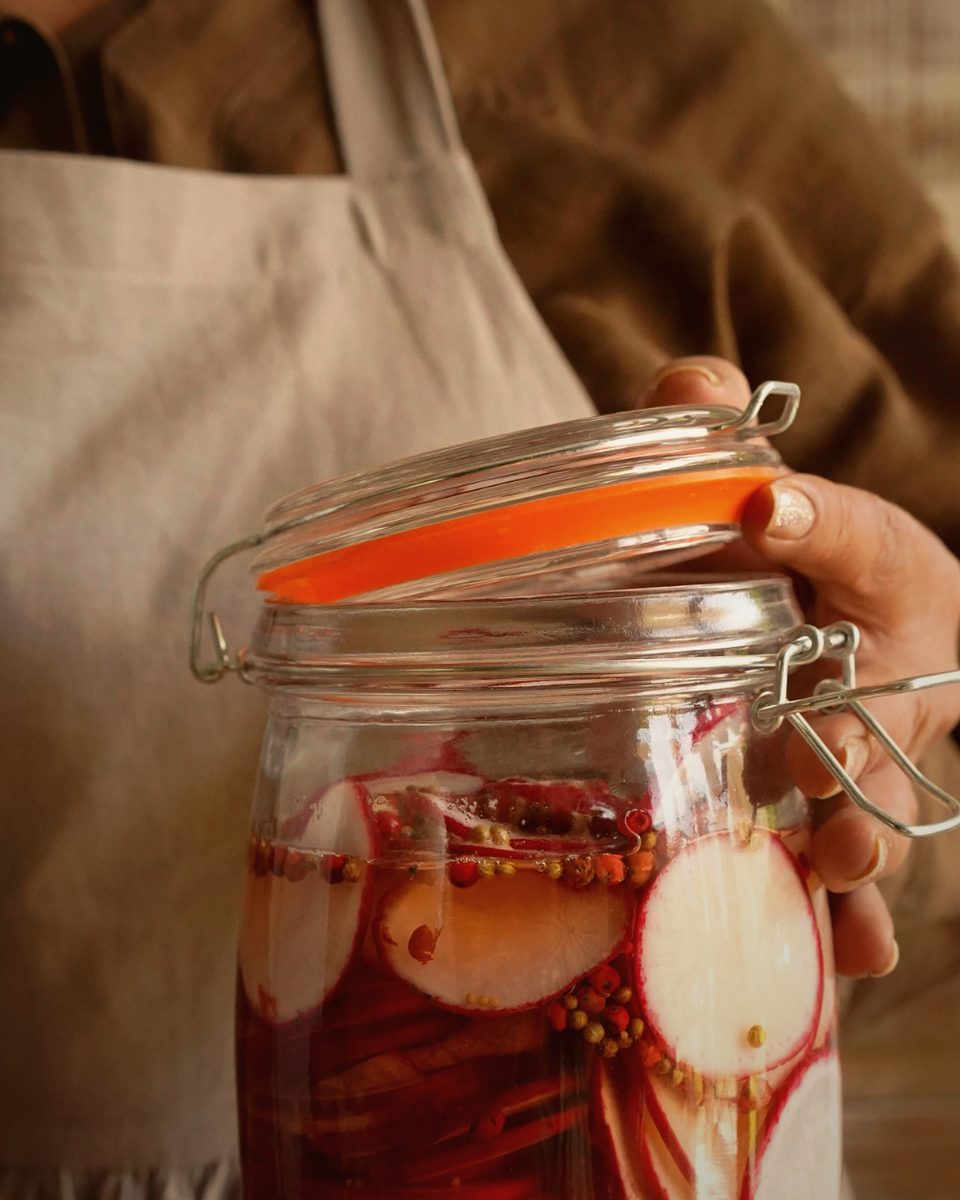 Pickle jars fermenting in cold-pressed mustard oil